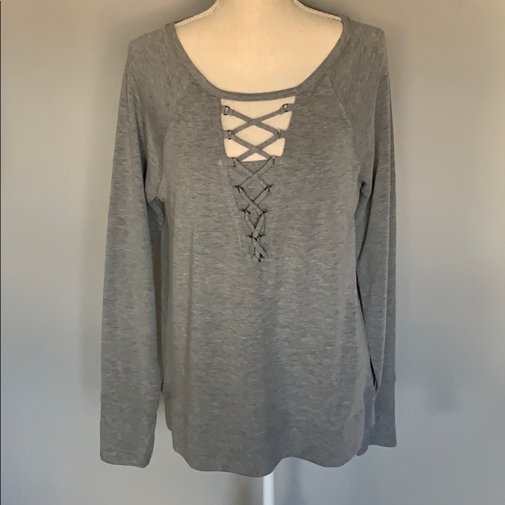 Soft mid weight V neck top with thumb holes. New.